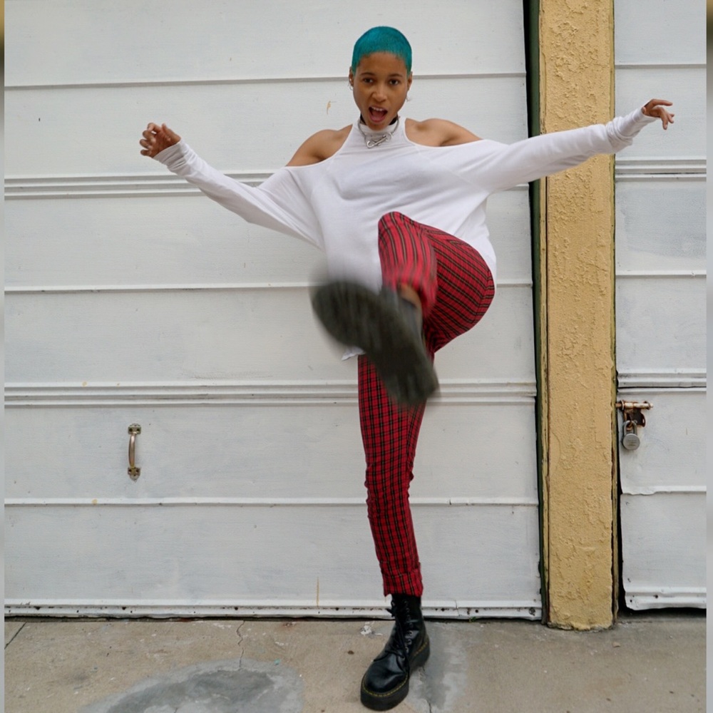 Unique deep cut-out shoulder top